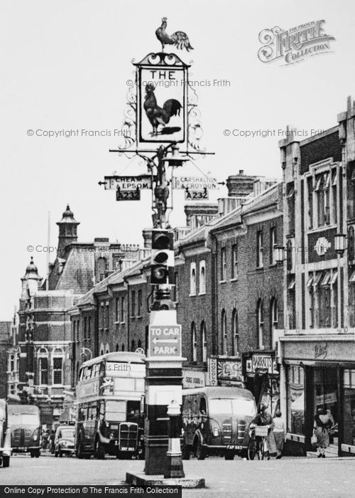 Photo of Sutton, High Street, The Cock Signpost c.1955