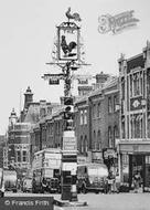 High Street, The Cock Signpost c.1955, Sutton