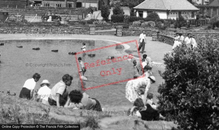 Photo of Sutton On Sea, Relaxing By The Children's Pool c.1950