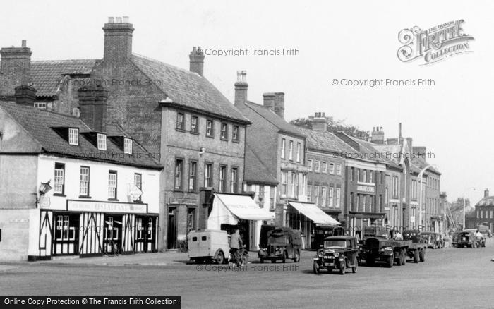 Photo of Swaffham, Shops In Market Place c.1939