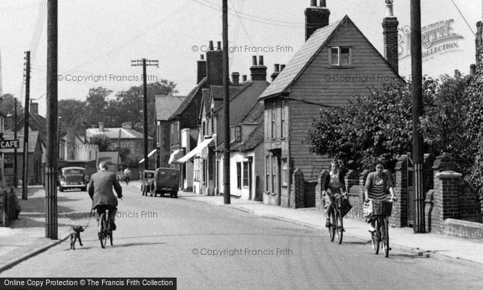 Photo of Thorpe Le Soken, Cycling In The High Street c.1955