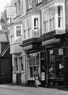 Shopkeeper In Conversation 1919, Westcott