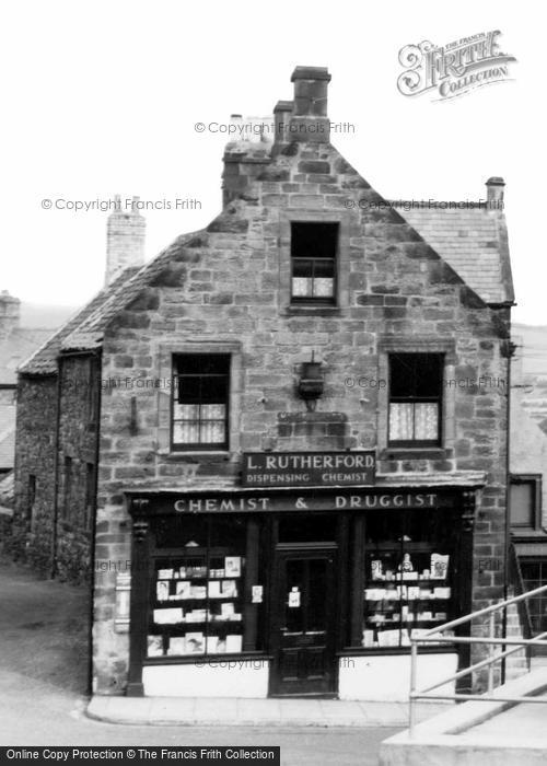 Photo of Wooler, L Rutherford Dispensing Chemist c.1955