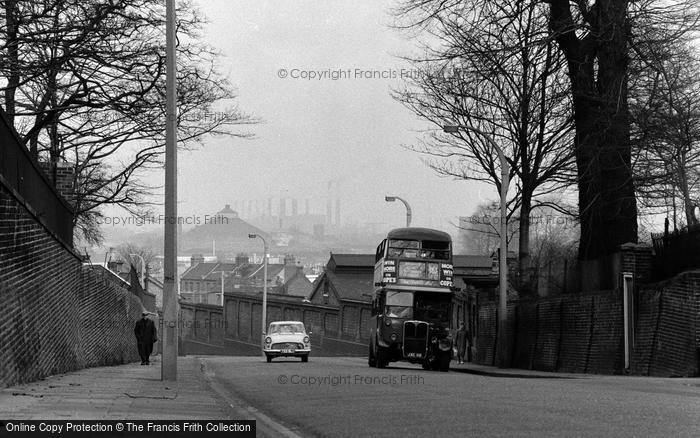 Photo of Woolwich, Bus Coming Up Grand Depot Road 1962