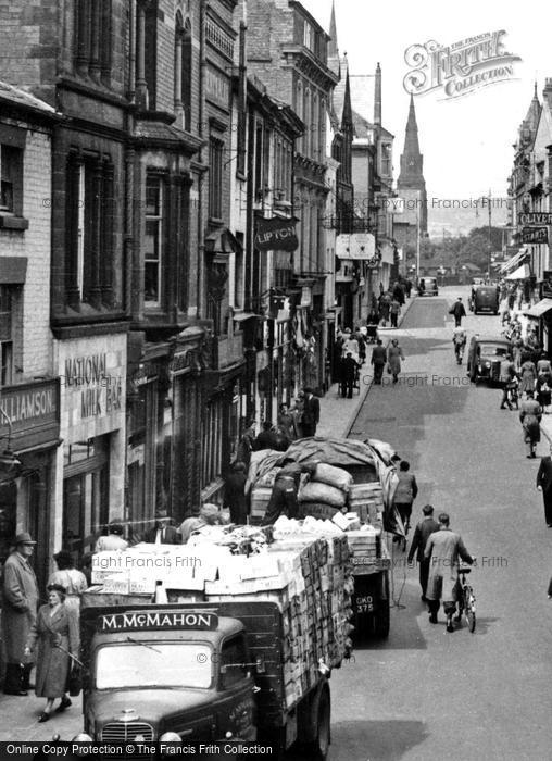 Photo of Wrexham, Delivery Vehicles In Hope Street c.1955